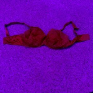 Red lace secret treasures woman’s bra.
